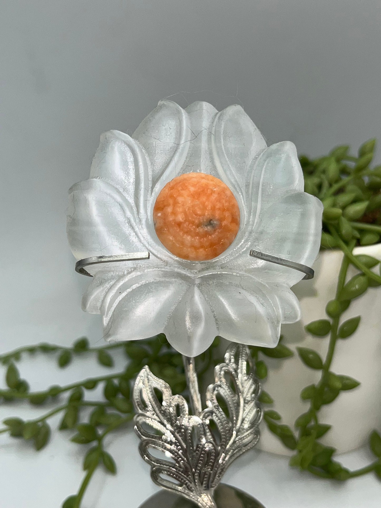 Selenite carved lotus flower on stand. Honey/Orange Calcite, meditation, satin spar, gypsum