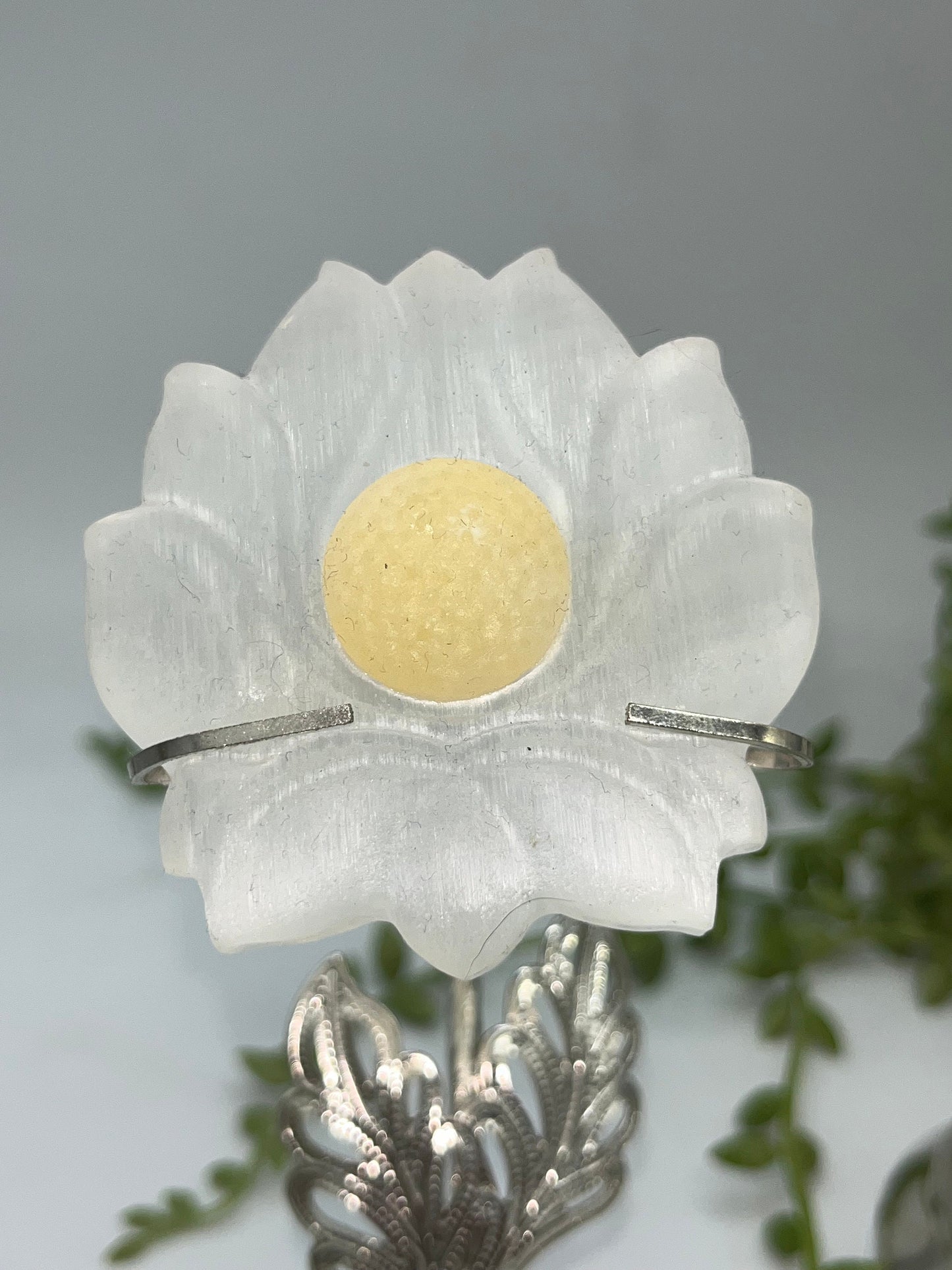 Selenite carved lotus flower on stand. Honey/Orange Calcite, meditation, satin spar, gypsum