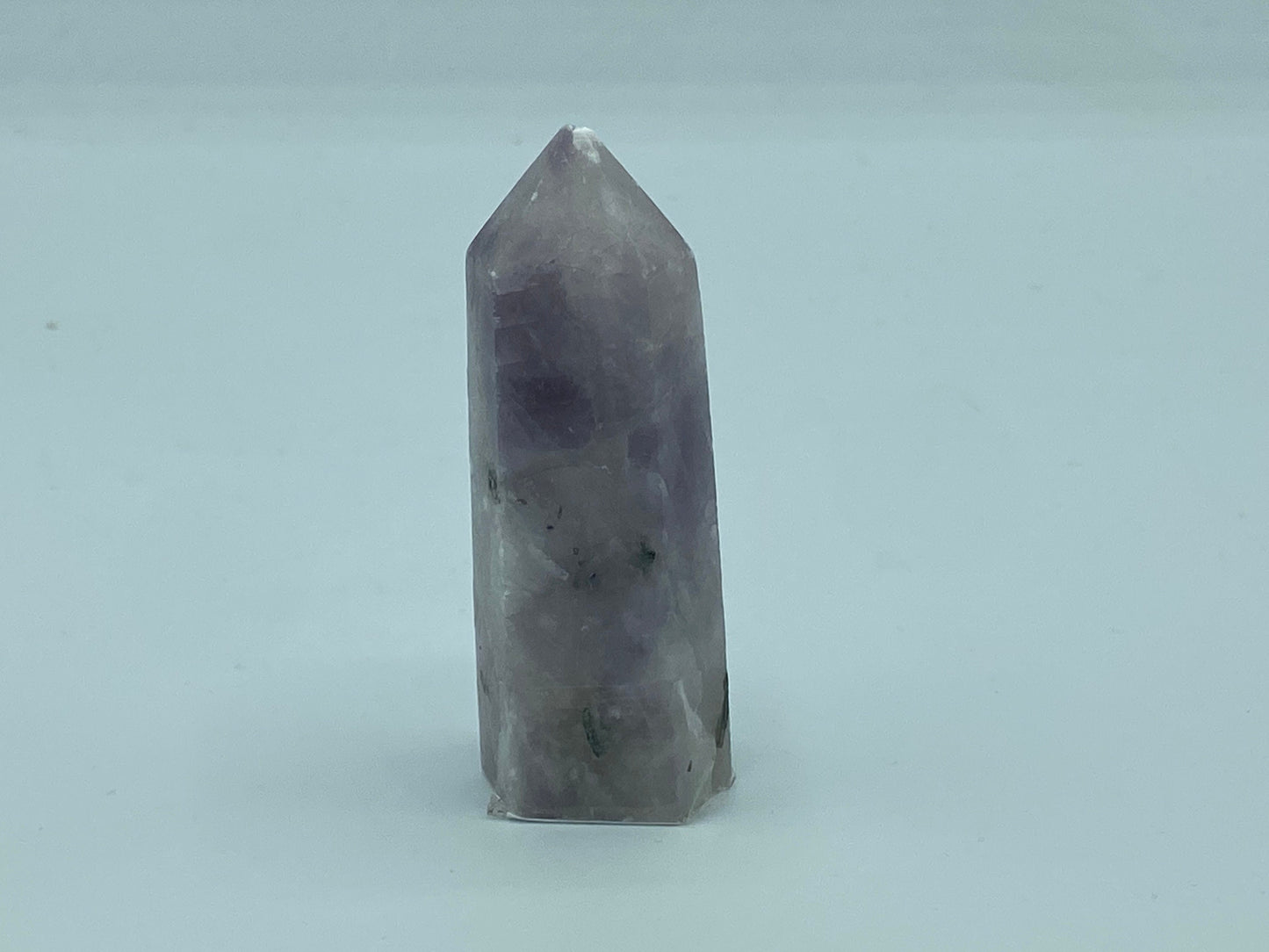 Kunzite towers with tourmaline and pyrite inclusions. Pick your favourite crystals. Metaphysical, love, romance, stone