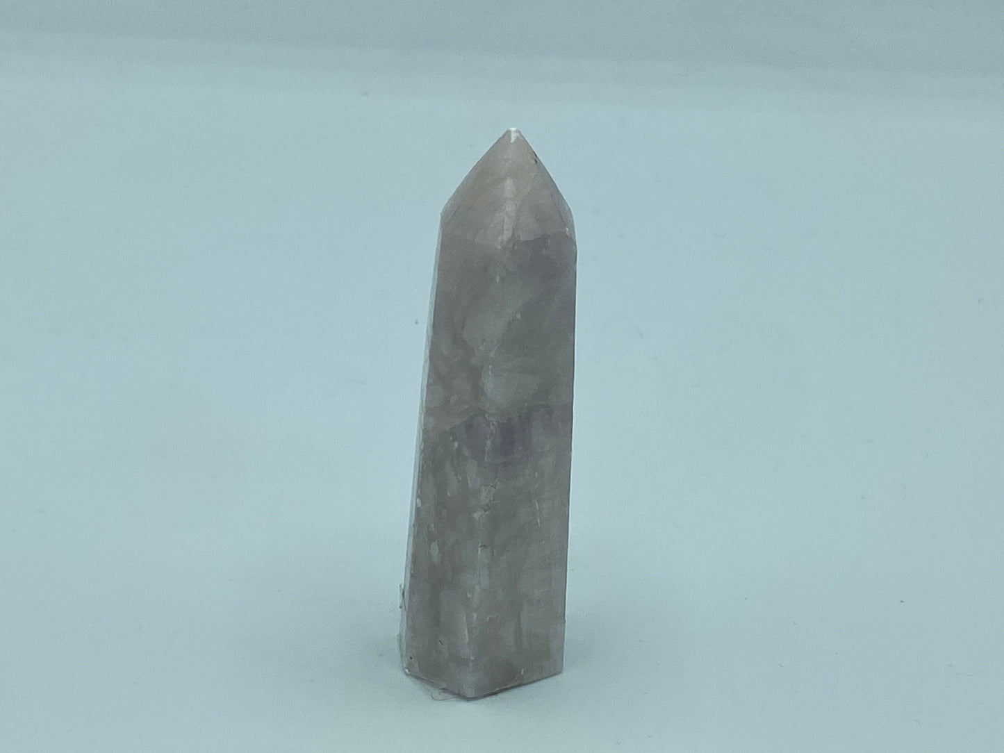 Kunzite towers with tourmaline and pyrite inclusions. Pick your favourite crystals. Metaphysical, love, romance, stone