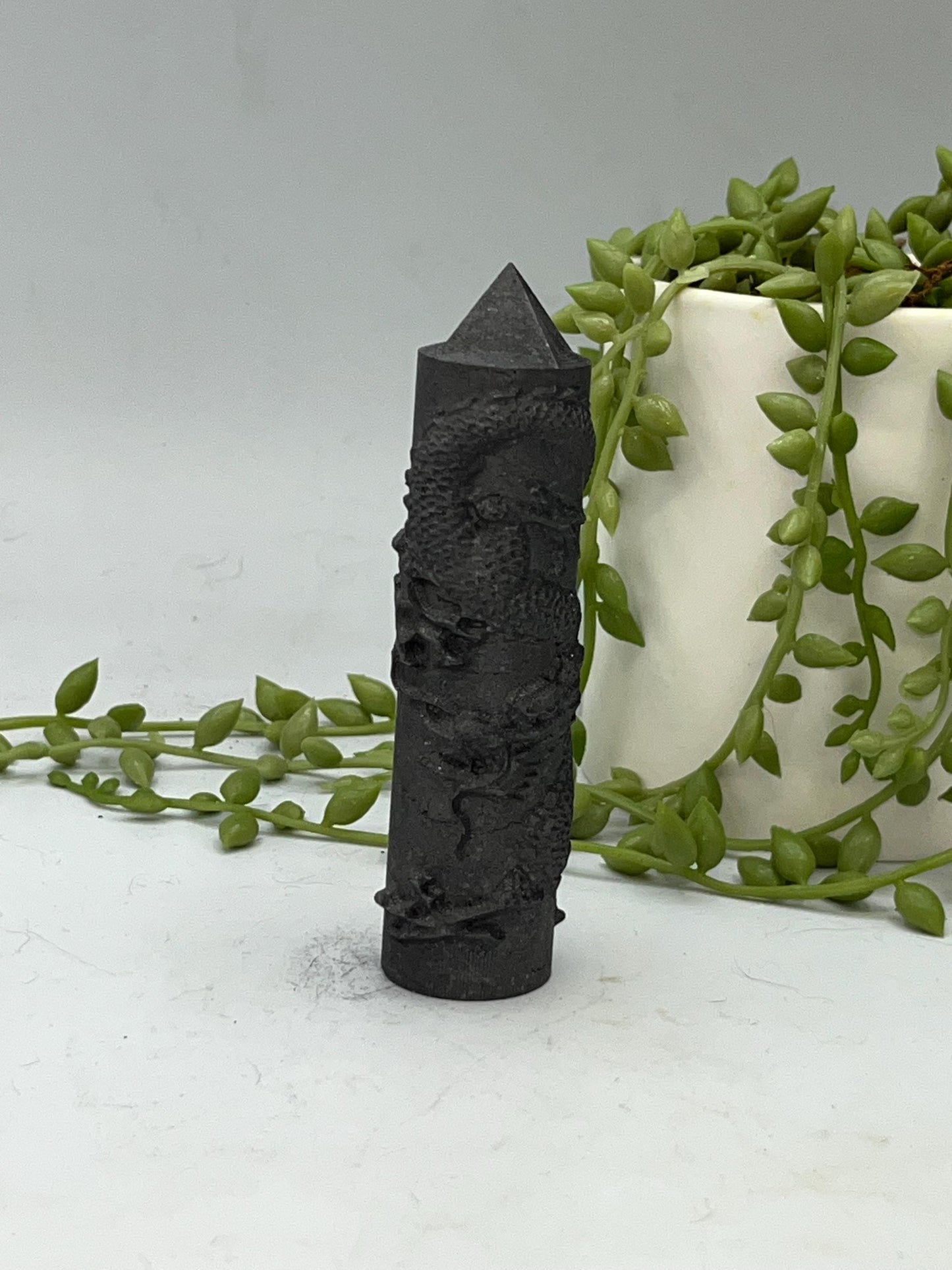 Shungite Chinese style Dragon round tower with pyramid tip.
