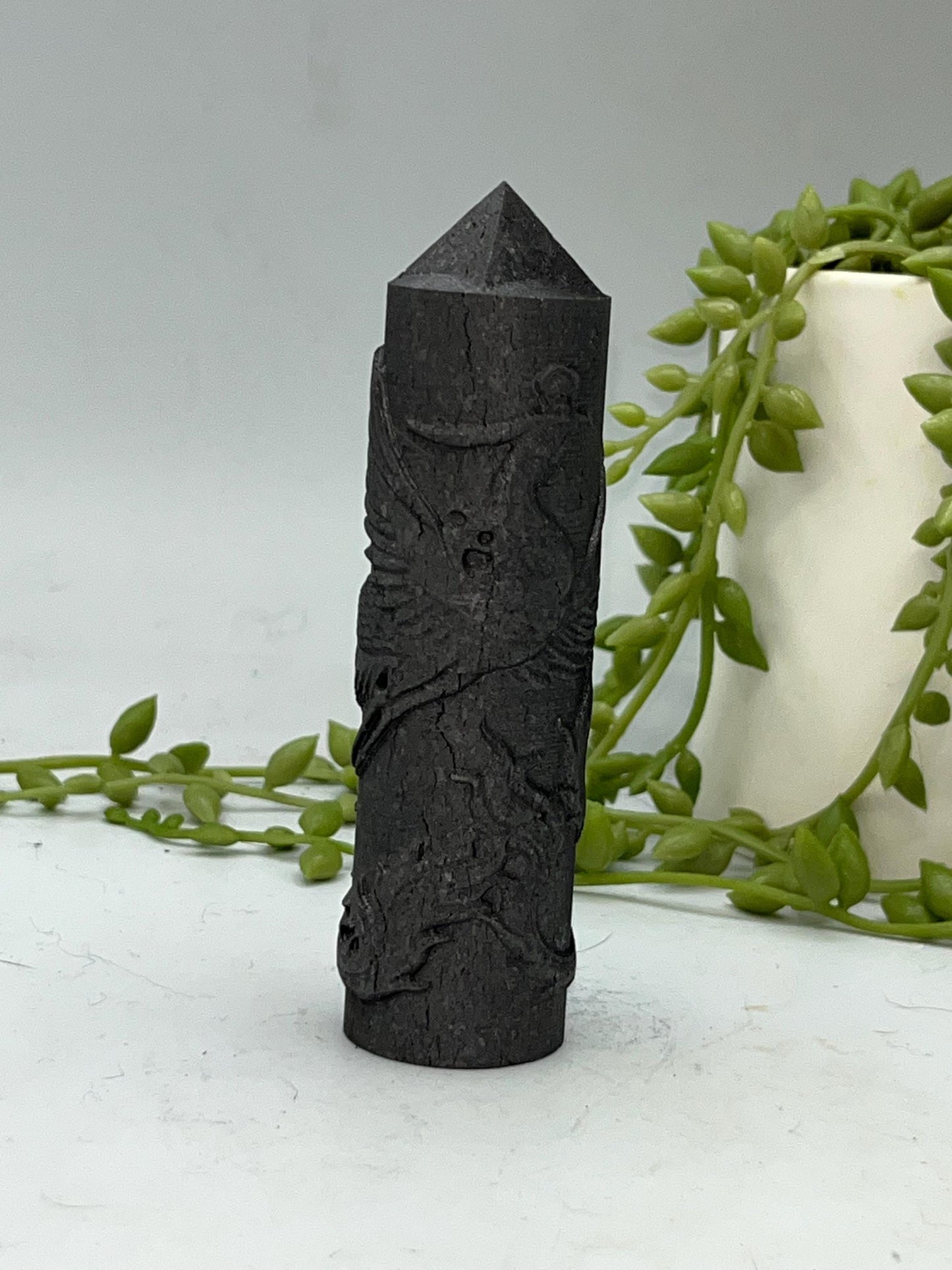 Shungite Phoenix round tower with pyramid tip.