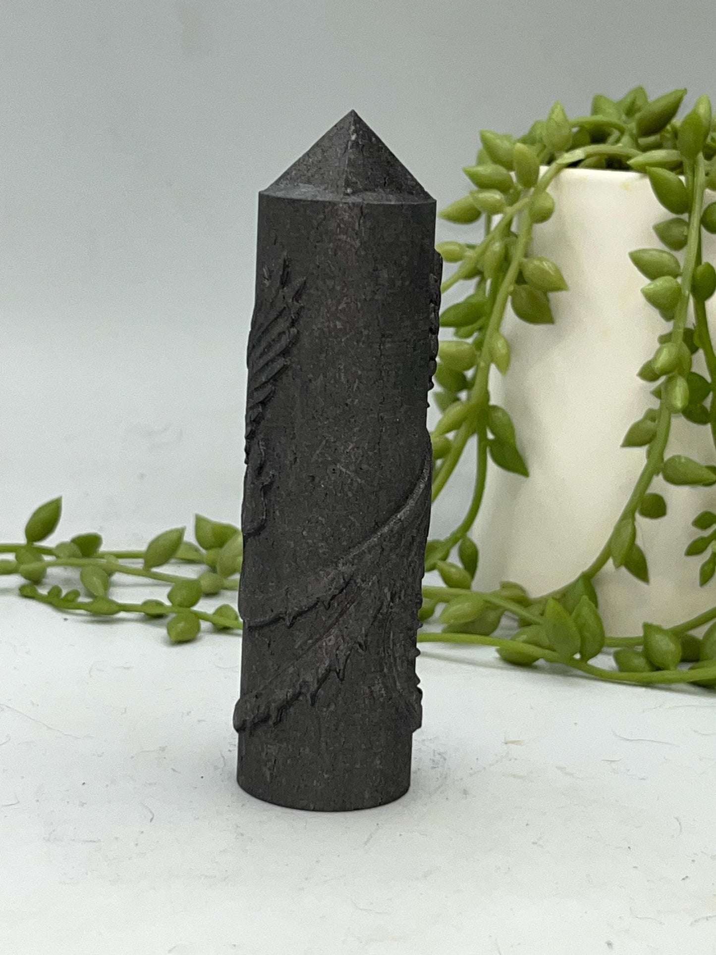 Shungite Phoenix round tower with pyramid tip.