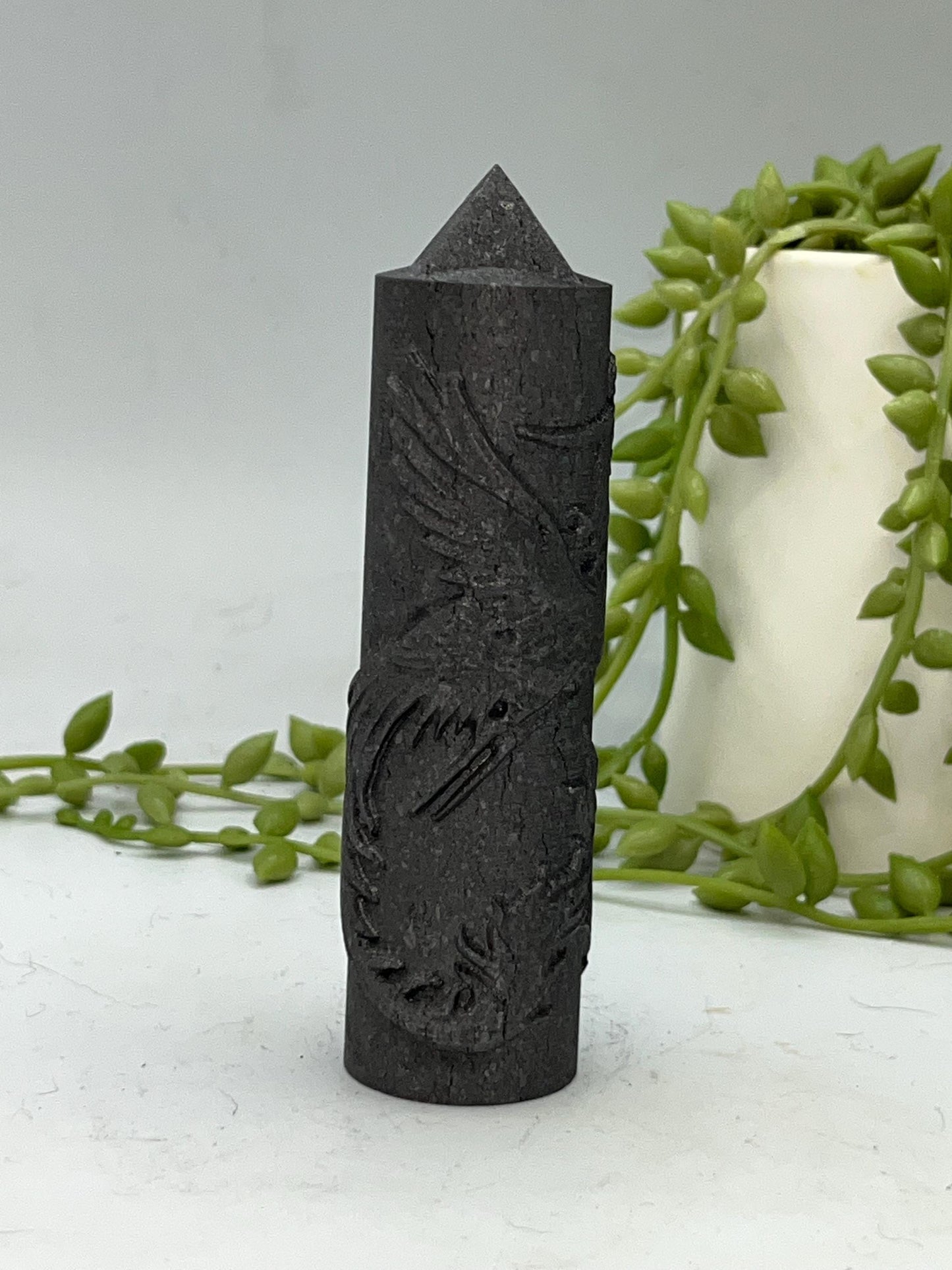 Shungite Phoenix round tower with pyramid tip.