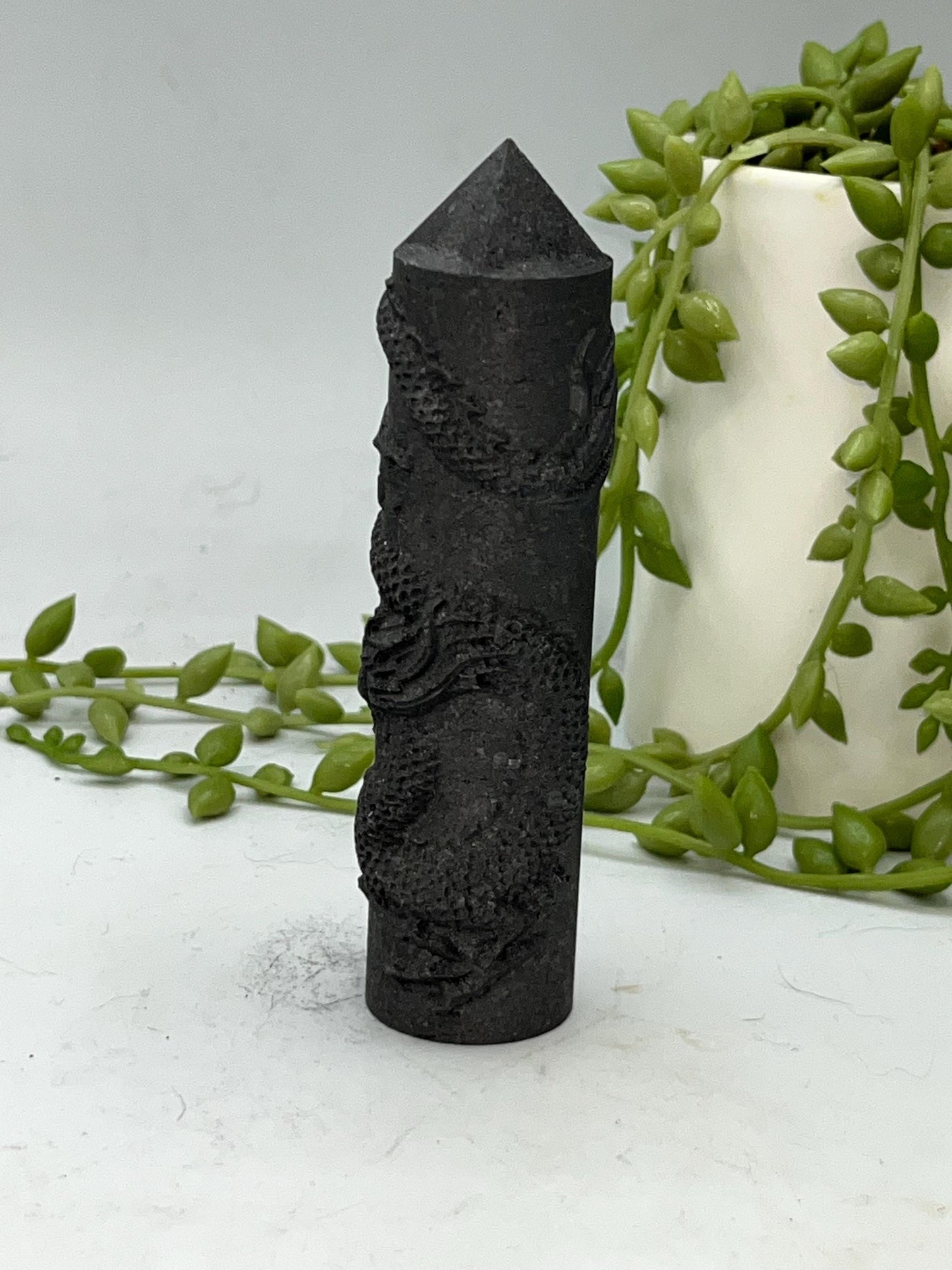 Shungite Chinese style Dragon round tower with pyramid tip.