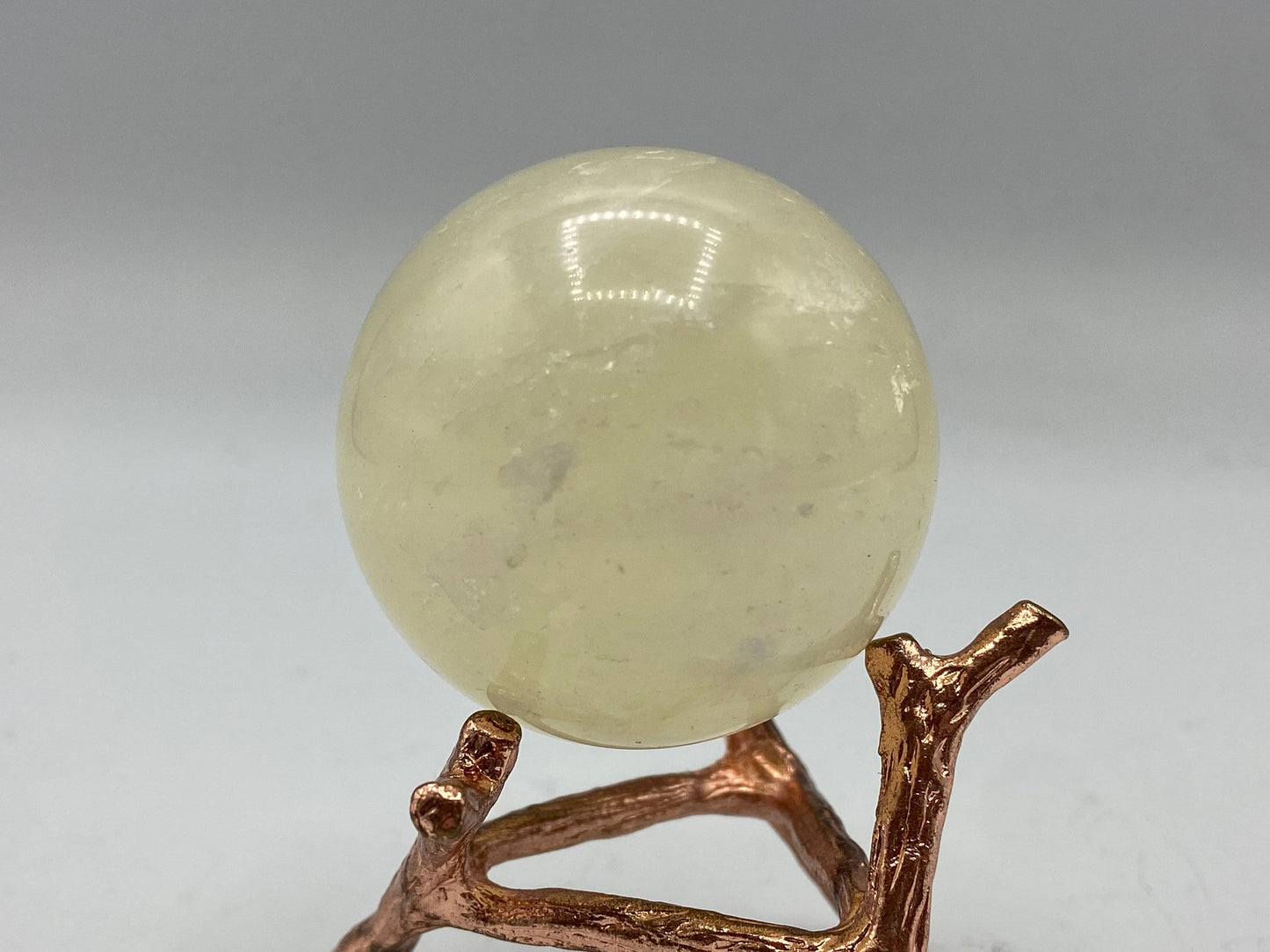 Yellow/lemon/cream calcite spheres with good flash,