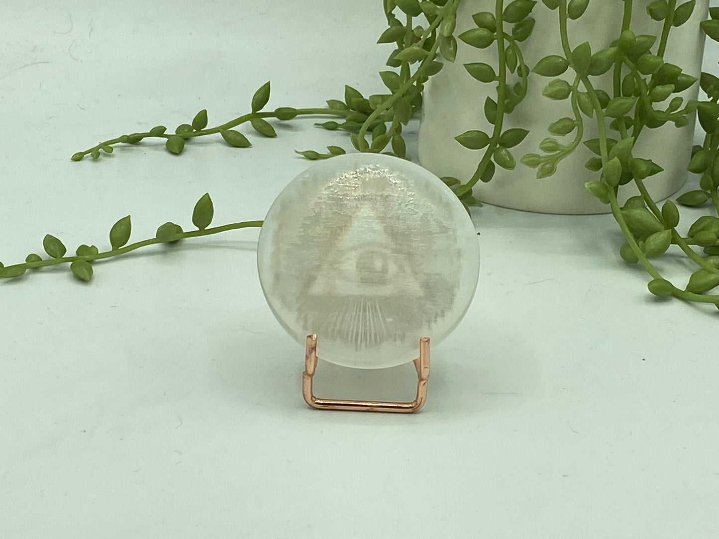 All seeing eye/Evil eye pattern on Selenite/Gypsum/Satin Spar small sized charging plate, Approx 55mm, cleansing and recharging,