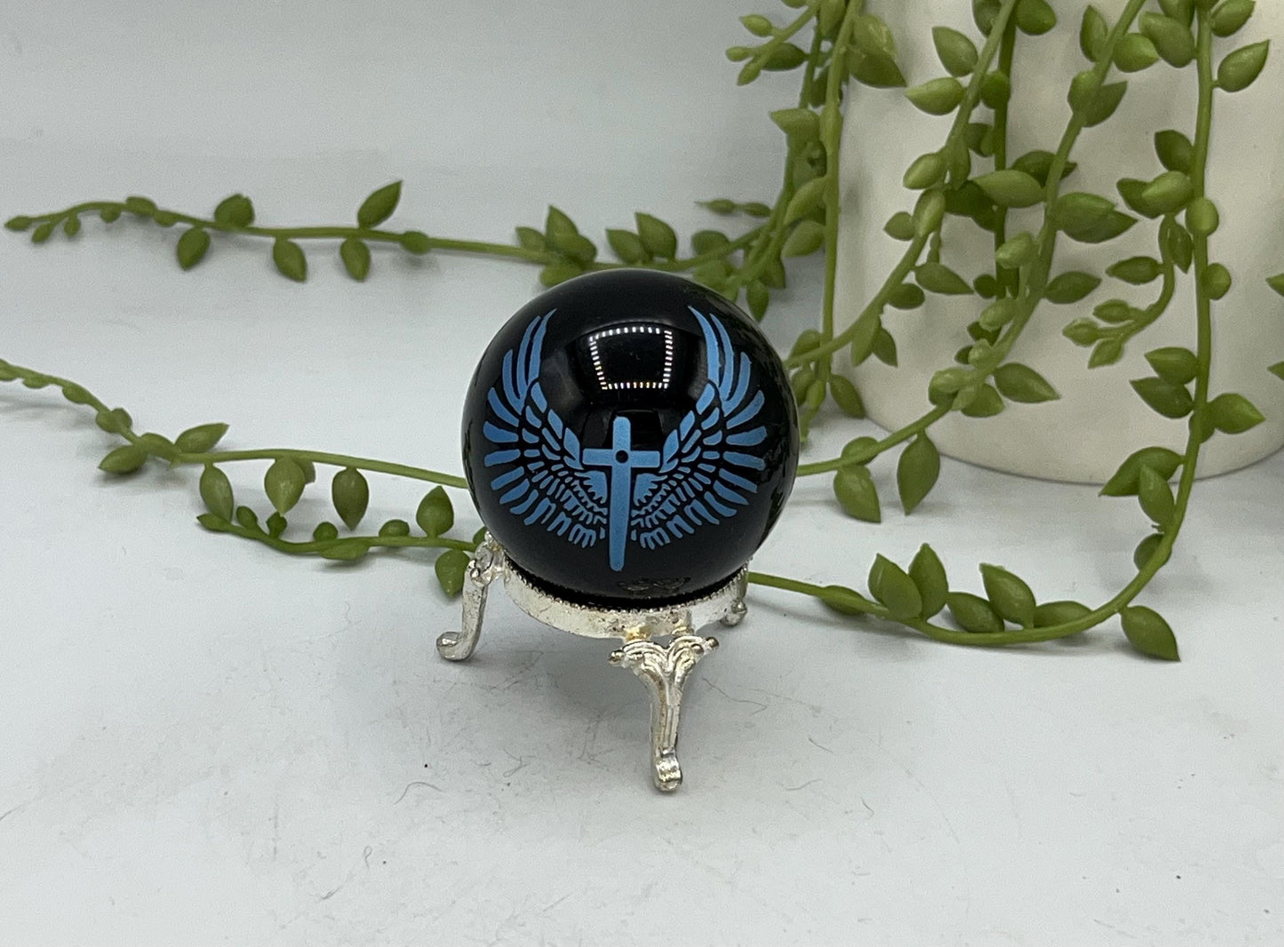 Black obsidian sphere with blue angel wings and crucifix engraving. crystal spheres, home decor, crystal healing, black Obsidian crystals