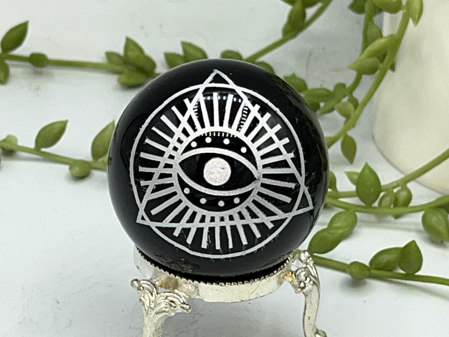Black Obsidian Sphere with a beautiful Eye of Horus design engraved in silver. Crystal Spheres, home decor, Obsidian Sphere, Birthday Gift