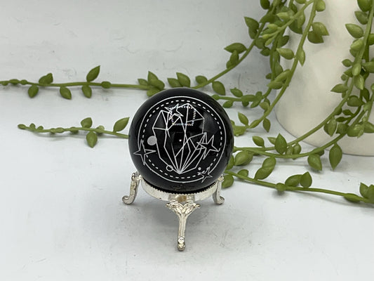 Black Obsidian Sphere with a crystal cluster & star design engraved in silver. Crystal Spheres, home decor, Obsidian Sphere, Birthday Gift