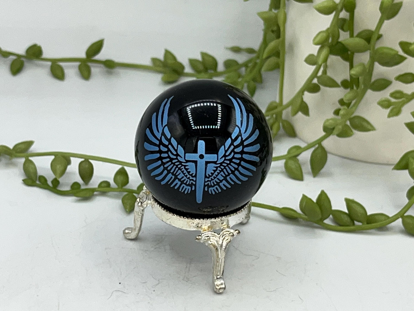 Black obsidian sphere with blue angel wings and crucifix engraving. crystal spheres, home decor, crystal healing, black Obsidian crystals