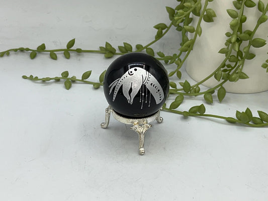 Black obsidian sphere with a beautiful mystical celestial hand pattern with moon phase engraved in silver. crystal spheres, home decor gift