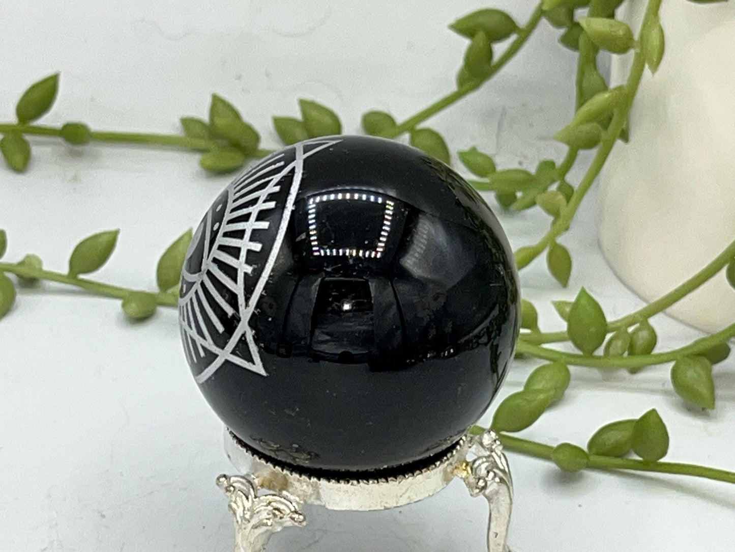 Black Obsidian Sphere with a beautiful Eye of Horus design engraved in silver. Crystal Spheres, home decor, Obsidian Sphere, Birthday Gift