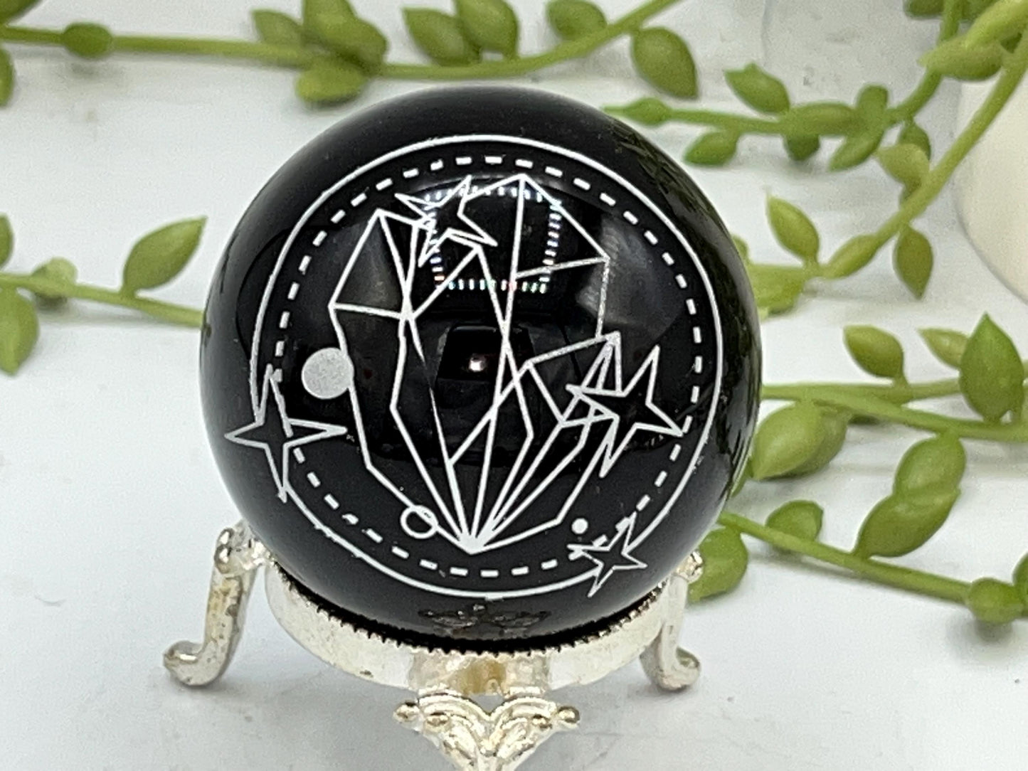Black Obsidian Sphere with a crystal cluster & star design engraved in silver. Crystal Spheres, home decor, Obsidian Sphere, Birthday Gift